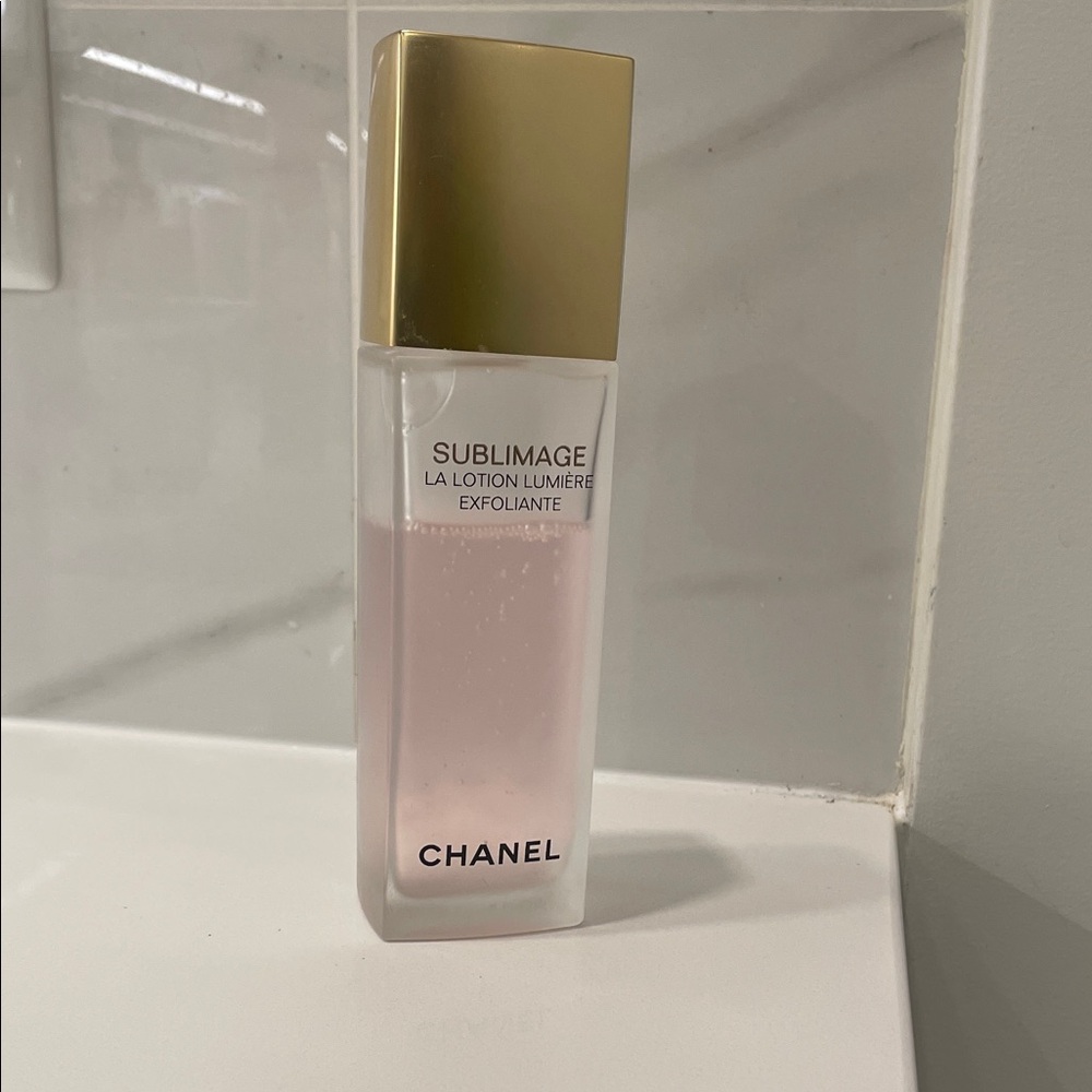 CHANEL Sublimage Exfoliating Lotion with Pink Hue and Gold Cap